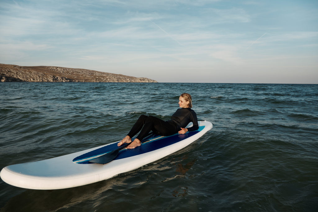 young-blonde-female-paddleboard-sea (1).jpg